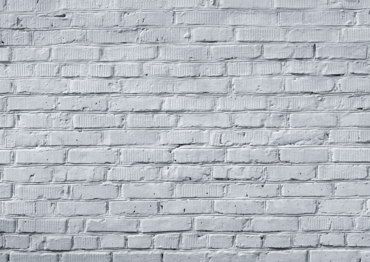 Textura bílé cihlové stěny